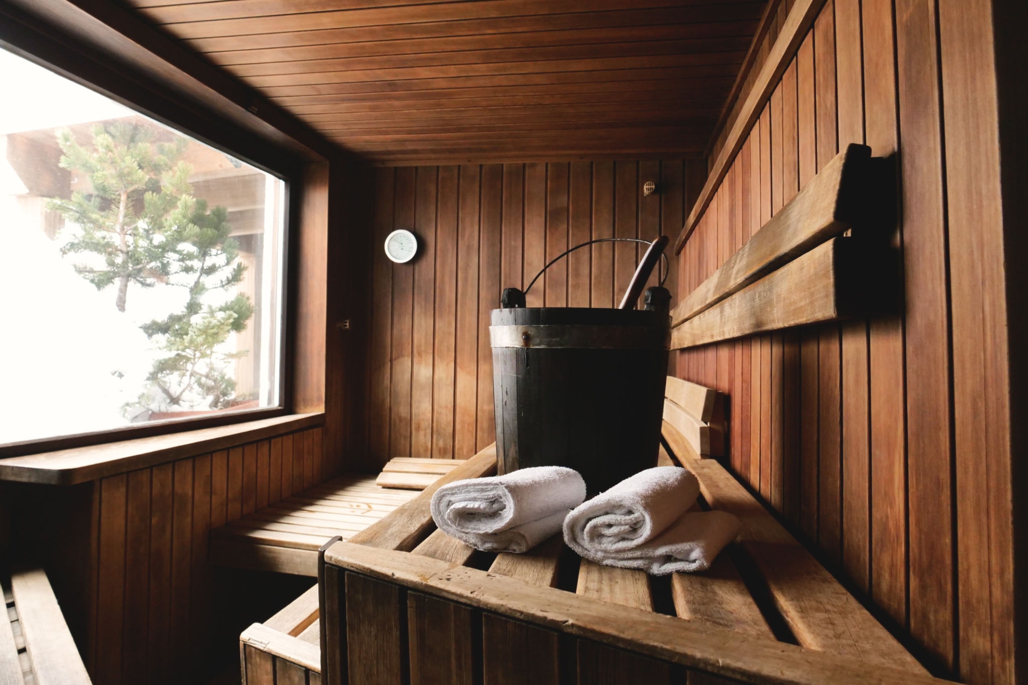 Richly conditioned sauna wood with restored color and natural sheen after treatment with Essential Sauna Wood Oil